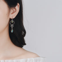 Load image into Gallery viewer, Vintage pair of earrings are pure 925 sterling silver. Embedded Turquoise Gemstone gives it an alluring look.