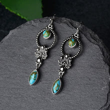 Load image into Gallery viewer, Vintage pair of earrings are pure 925 sterling silver. Embedded Turquoise Gemstone gives it an alluring look.